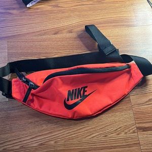 Red and black Fanny pack from Nike